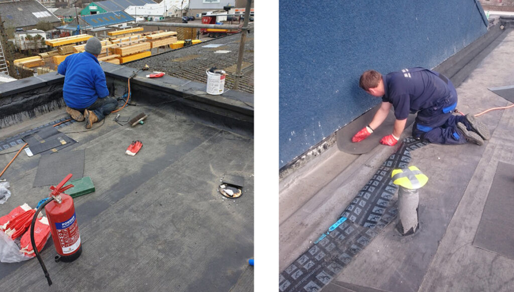 Men working on a new flat roof at height